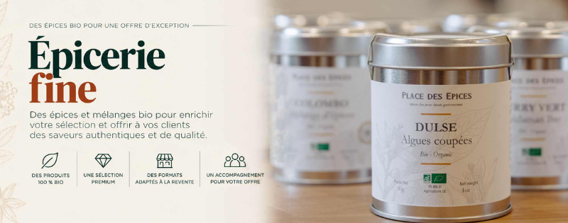 Épicerie fine branding on the left with product jars labeled Dulse algues coupées on a wooden counter on the right.